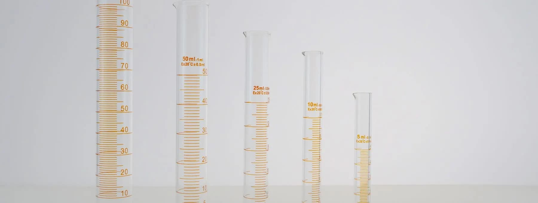 a row of graduated cylinders