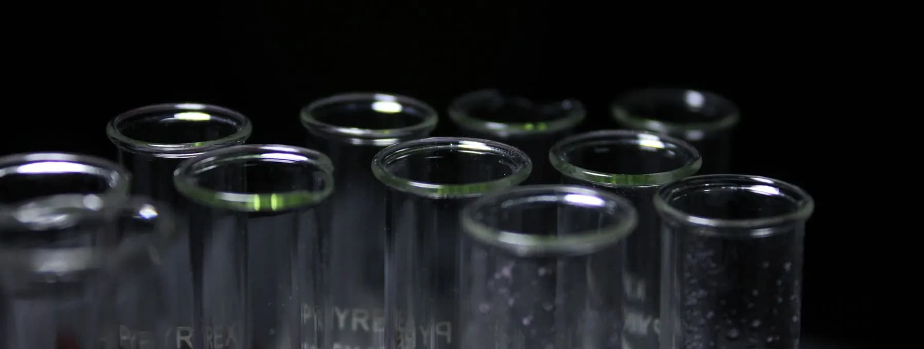 dark glass tubes in low light